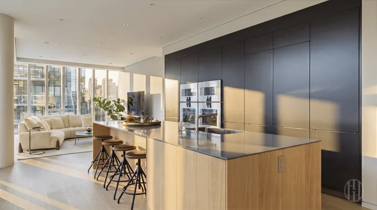 Kitchen and living room at 515 West 29th Street, Residence 9